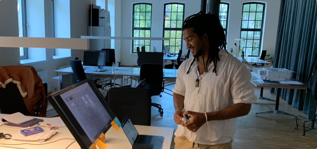 Kwadwo Malcom working in our Berlin office